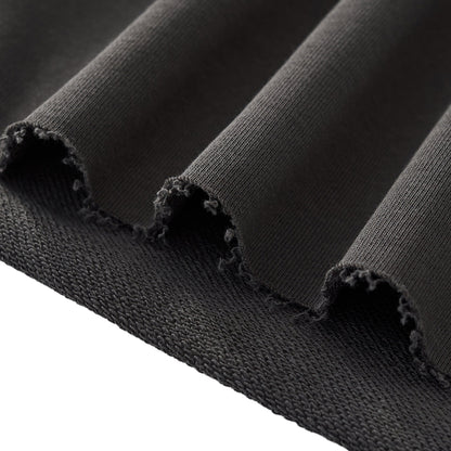 Close-up of black fabric with a textured surface